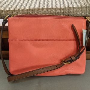 Fossil crossbody. Peachy salmon hue.